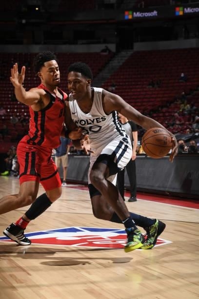 Nathan Knight of the Minnesota Timberwolves drives to the basket against the Chicago Bulls during the 2021 Las Vegas Summer League on August 12, 2021...