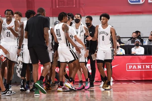 Cam Thomas of the Brooklyn Nets high fives after making the game winning basket against the Washington Wizards during the 2021 Las Vegas Summer...