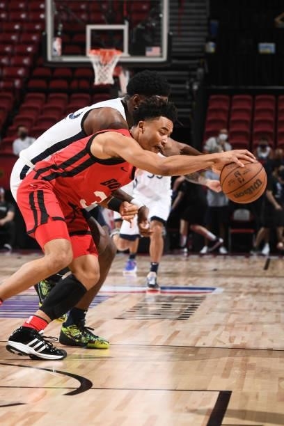 Devon Dotson of the Chicago Bulls reaches for the ball during the game against the Minnesota Timberwolves during the 2021 Las Vegas Summer League on...