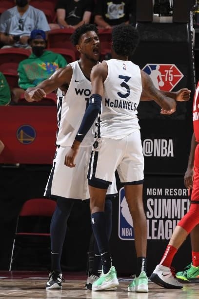 John Egbunu and Jaden McDaniels of the Minnesota Timberwolves reacts to a play during the game against the Chicago Bulls during the 2021 Las Vegas...