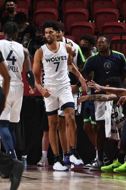 Brian Bowen II of the Minnesota Timberwolves high fives his teammates during the game against the Chicago Bulls during the 2021 Las Vegas Summer...