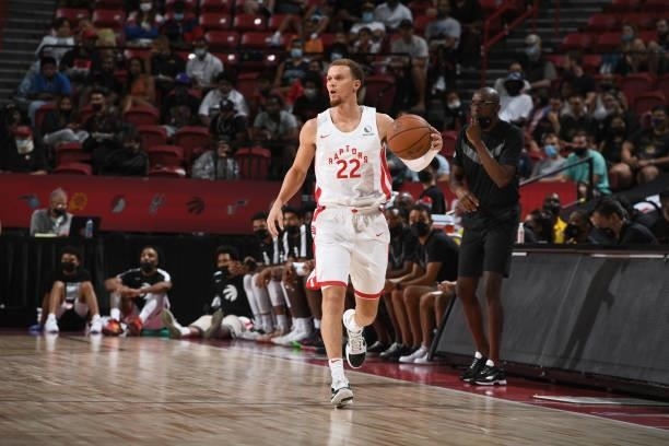 Malachi Flynn of the Toronto Raptors handles the ball during the game against the Houston Rockets during the 2021 Las Vegas Summer League on August...
