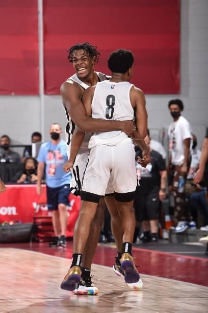 DayRon Sharpe of the Brooklyn Nets hugs Cam Thomas of the Brooklyn Nets after shooting the game winning basket against the Washington Wizards during...