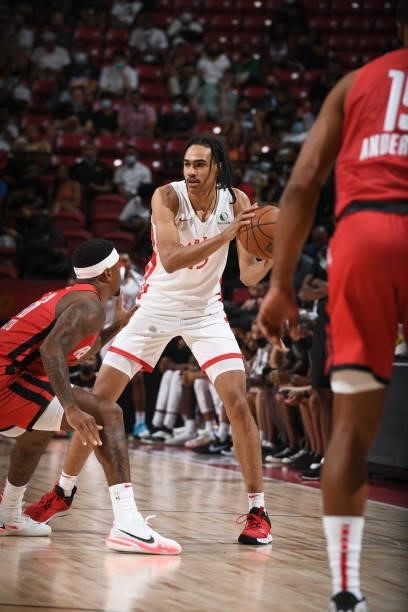Dalano Banton of the Toronto Raptors handles the ball against the Houston Rockets during the 2021 Las Vegas Summer League on August 12, 2021 at the...