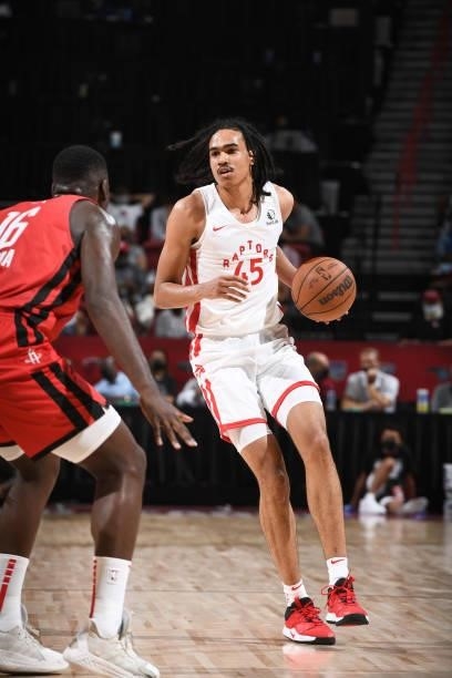 Dalano Banton of the Toronto Raptors handles the ball against the Houston Rockets during the 2021 Las Vegas Summer League on August 12, 2021 at the...