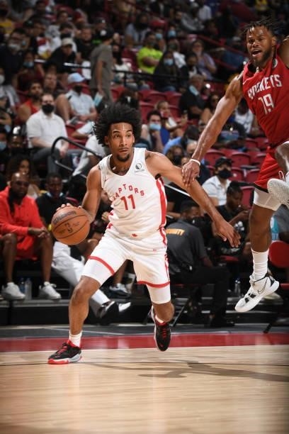 Justin Champagnie of the Toronto Raptors dribbles the ball against the Houston Rockets during the 2021 Las Vegas Summer League on August 12, 2021 at...