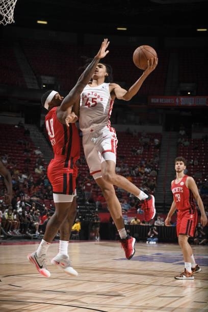 Dalano Banton of the Toronto Raptors drives to the basket against the Houston Rockets during the 2021 Las Vegas Summer League on August 12, 2021 at...