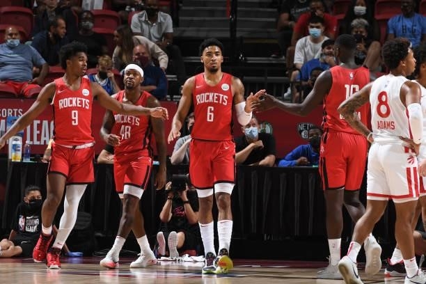 Kenyon Martin Jr. #6 of the Houston Rockets high fives teammates during the game against the Toronto Raptors during the 2021 Las Vegas Summer League...