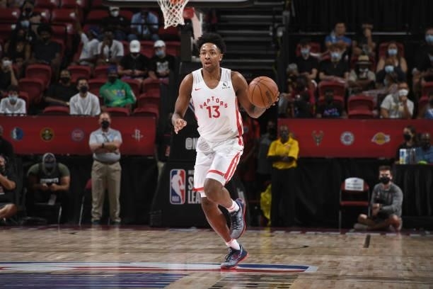 David Johnson of the Toronto Raptors dribbles the ball during the game against the Houston Rockets during the 2021 Las Vegas Summer League on August...