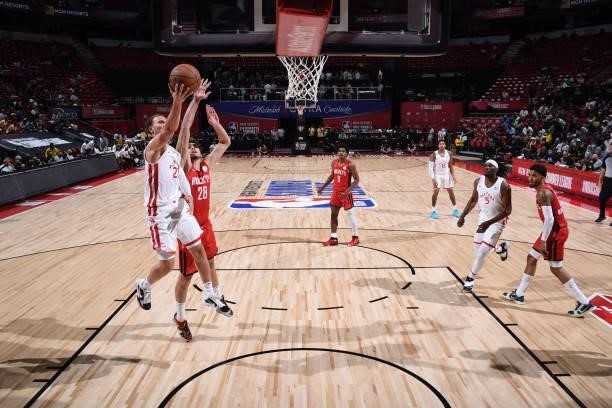 Malachi Flynn of the Toronto Raptors drives to the basket agains the Houston Rockets during the 2021 Las Vegas Summer League on August 12, 2021 at...