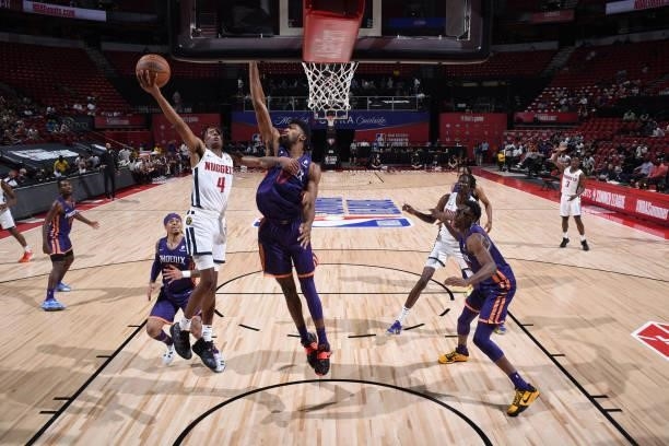 Nah'Shon Hyland of the Denver Nuggets drives to the basket against the Phoenix Suns during the 2021 Las Vegas Summer League on August 12, 2021 at the...