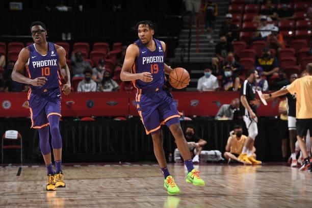 Justin Simon of the Phoenix Suns handles the ball during the game against the Denver Nuggets during the 2021 Las Vegas Summer League on August 12,...