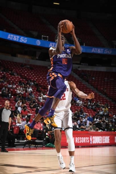 Jalen Smith of the Phoenix Suns drives to the basket against the Denver Nuggets during the 2021 Las Vegas Summer League on August 12, 2021 at the...