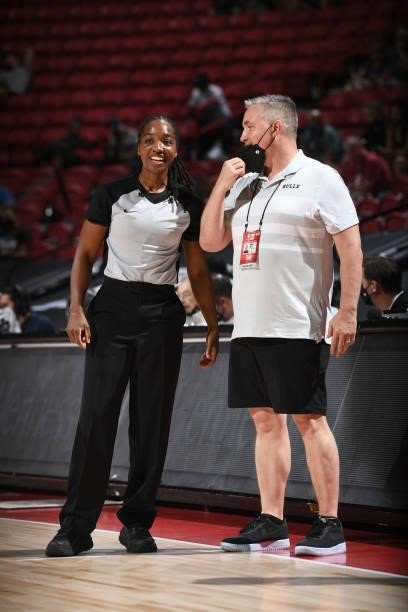 Referee, Karleena Tobin talks to Head Coach, Damian Cotter of the Chicago Bulls during the game against the Minnesota Timberwolves during the 2021...