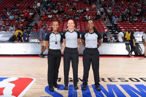 Referees, Chastity Taylor, Ashley Gloss and Karleena Tobin take a photo before the game between the Chicago Bulls and the Minnesota Timberwolves...