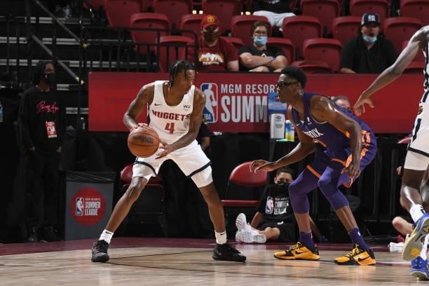 Nah'Shon Hyland of the Denver Nuggets handles the ball against the Phoenix Suns during the 2021 Las Vegas Summer League on August 12, 2021 at the...