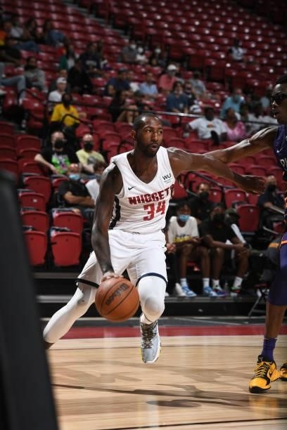 Davon Reed of the Denver Nuggets handles the ball during the game against the Phoenix Suns during the 2021 Las Vegas Summer League on August 12, 2021...