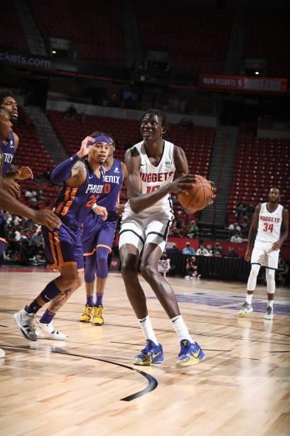 Bol Bol of the Denver Nuggets drives to the basket against the Phoenix Suns during the 2021 Las Vegas Summer League on August 12, 2021 at the Thomas...
