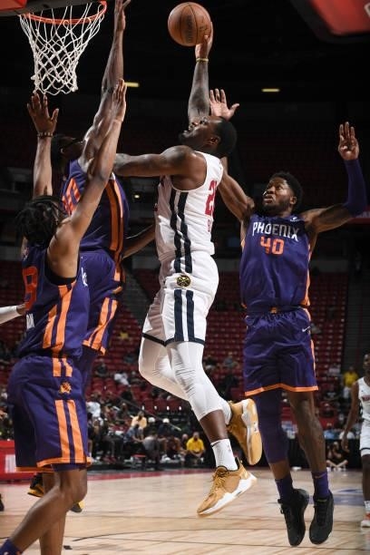 Tarik Black of the Denver Nuggets drives to the basket against the Phoenix Suns during the 2021 Las Vegas Summer League on August 12, 2021 at the...