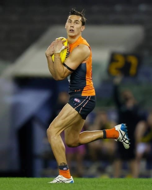 Isaac Cumming of the Giants in action during the 2021 AFL Round 22 match between the GWS Giants and the Richmond Tigers at Marvel Stadium on August...