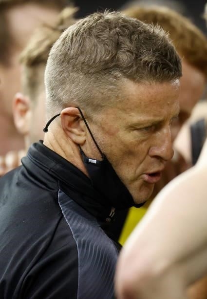 Damien Hardwick, Senior Coach of the Tigers addresses his players during the 2021 AFL Round 22 match between the GWS Giants and the Richmond Tigers...