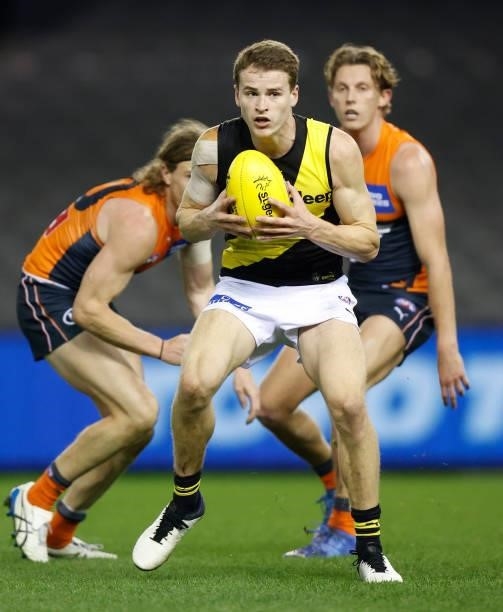 Thomson Dow of the Tigers in action during the 2021 AFL Round 22 match between the GWS Giants and the Richmond Tigers at Marvel Stadium on August 13,...