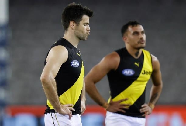 Sydney Stack and Trent Cotchin of the Tigers look dejected after a loss during the 2021 AFL Round 22 match between the GWS Giants and the Richmond...