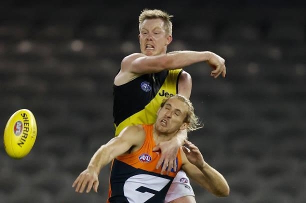 Jack Riewoldt of the Tigers and Nick Haynes of the Giants in action during the 2021 AFL Round 22 match between the GWS Giants and the Richmond Tigers...