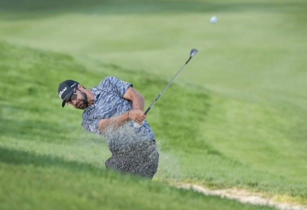 Tom Whitney plays a bunker shot on the first hole during the second round of the Korn Ferry Tours Pinnacle Bank Championship presented by Aetna at...