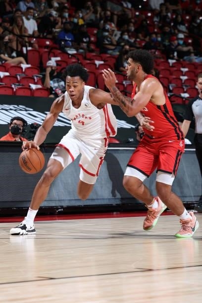 Scottie Barnes of the Toronto Raptors dribbles the ball during the game against the Houston Rockets during the 2021 Las Vegas Summer League on August...