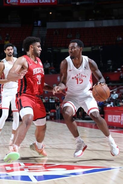 Isiaha Mike of the Toronto Raptors dribbles the ball during the game against the Houston Rockets during the 2021 Las Vegas Summer League on August...