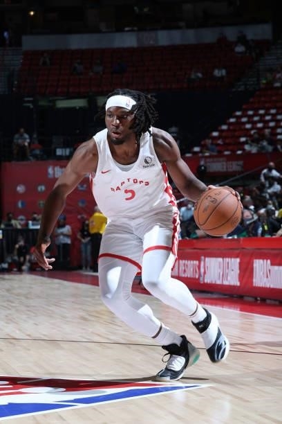 Precious Achiuwa of the Toronto Raptors dribbles the ball during the game against the Houston Rockets during the 2021 Las Vegas Summer League on...