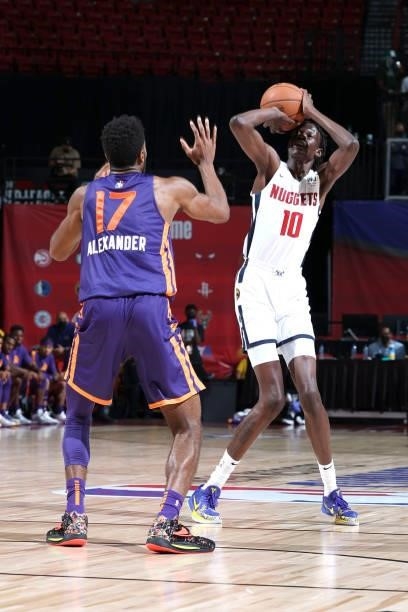 Bol Bol of the Denver Nuggets shoots a three point basket during the game against the Phoenix Suns during the 2021 Las Vegas Summer League on August...