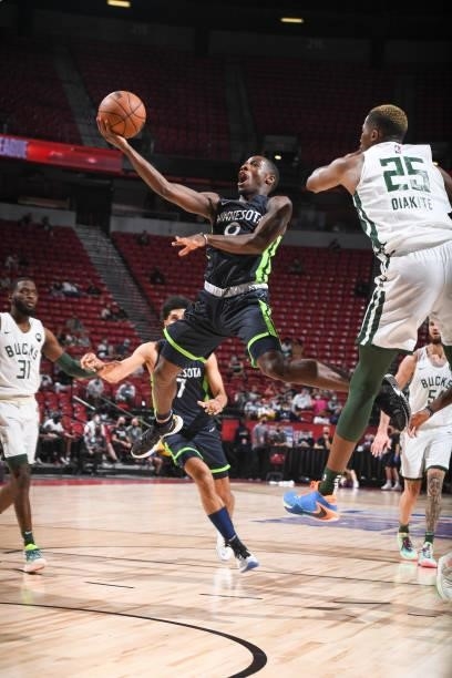 Isaiah Miller of the Minnesota Timberwolves drives to the basket during the game agains the Milwaukee Bucks during the 2021 Las Vegas Summer League...