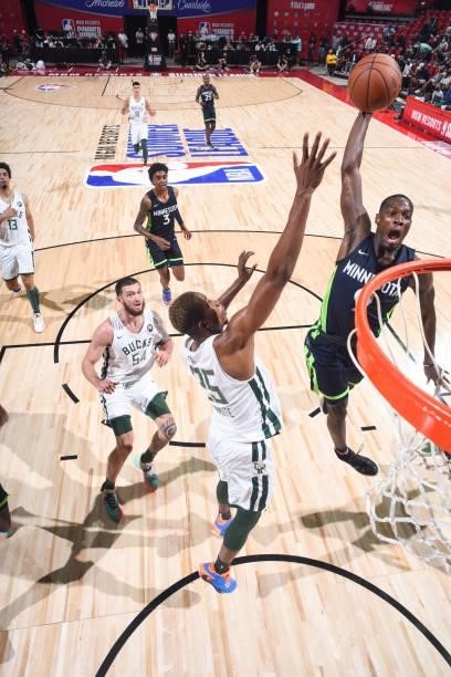 Isaiah Miller of the Minnesota Timberwolves dunks the ball during the game agains the Milwaukee Bucks during the 2021 Las Vegas Summer League on...