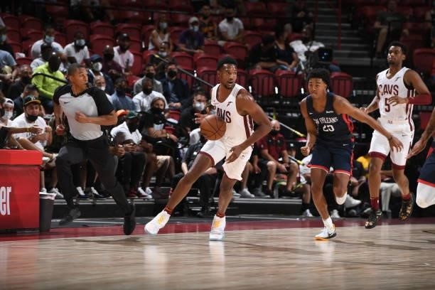 Evan Mobley of the Cleveland Cavaliers dribbles during the game against the New Orleans Pelicans during the 2021 Las Vegas Summer League on August...