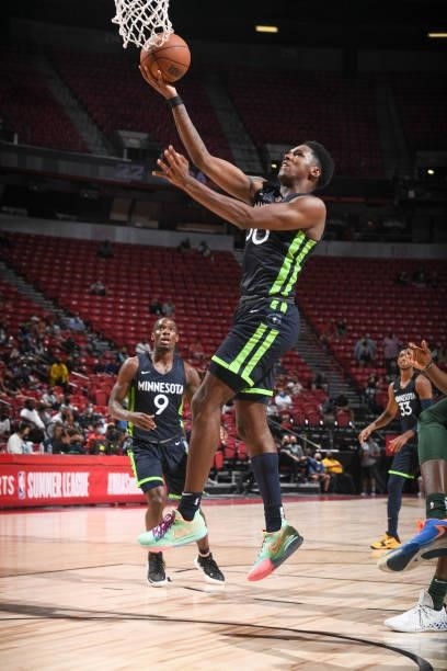 Nathan Knight of the Minnesota Timberwolves drives to the basket during the game agains the Milwaukee Bucks during the 2021 Las Vegas Summer League...