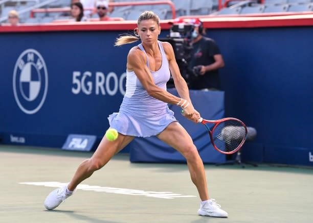 Camila Giorgi of Italy prepares to hit a return during her Womens Singles Quarterfinals match against Cori Gauff of the United States on Day Five of...