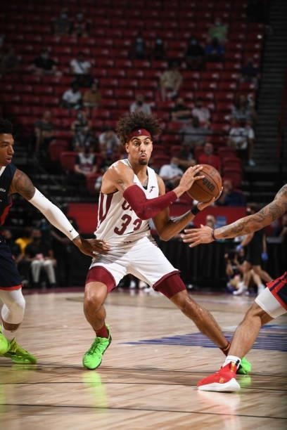 Brodric Thomas of the Cleveland Cavaliers looks to pass during the game against the New Orleans Pelicans during the 2021 Las Vegas Summer League on...