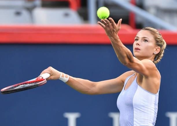 Camila Giorgi of Italy serves during her Womens Singles Quarterfinals match against Cori Gauff of the United States on Day Five of the National Bank...