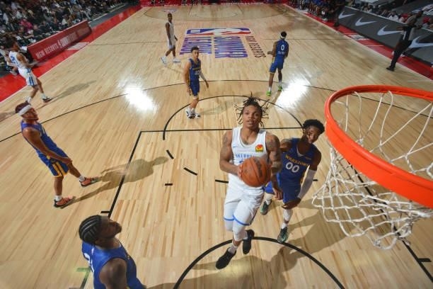 Rob Edwards of the Oklahoma City Thunder drives to the basket during the game against the Golden State Warriors during the 2021 Las Vegas Summer...