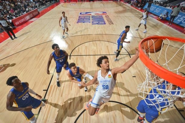 Jeremiah Robinson-Earl of the Oklahoma City Thunder fights for the rebound during the game against the Golden State Warriors during the 2021 Las...