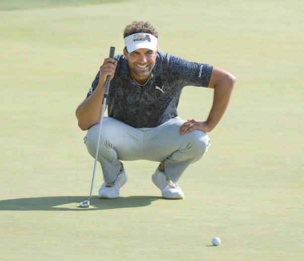 Curtis Thompson studies his putt on the 12th hole during the second round of the Korn Ferry Tours Pinnacle Bank Championship presented by Aetna at...