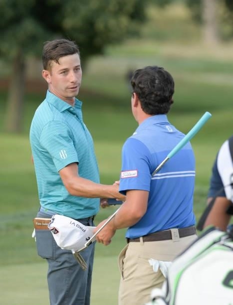 Vince India and Patrick Flavin shake hands on the 18th green during the second round of the Korn Ferry Tours Pinnacle Bank Championship presented by...