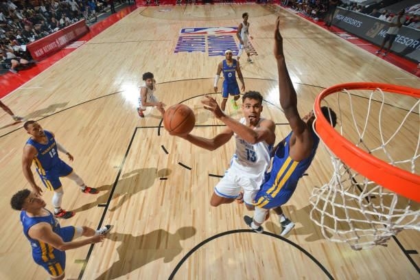 Oscar da Silva of the Oklahoma City Thunder drives to the basket during the game against the Golden State Warriors during the 2021 Las Vegas Summer...