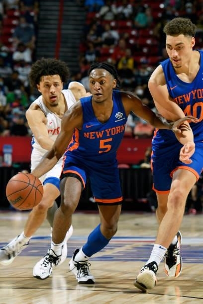 Immanuel Quickley of the New York Knicks dribbles the ball during the game against the Detroit Pistons during the 2021 Las Vegas Summer League on...