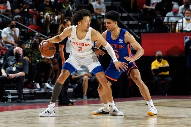 Quentin Grimes of the New York Knicks plays defense on Cade Cunningham of the Detroit Pistons during the 2021 Las Vegas Summer League on August 13,...