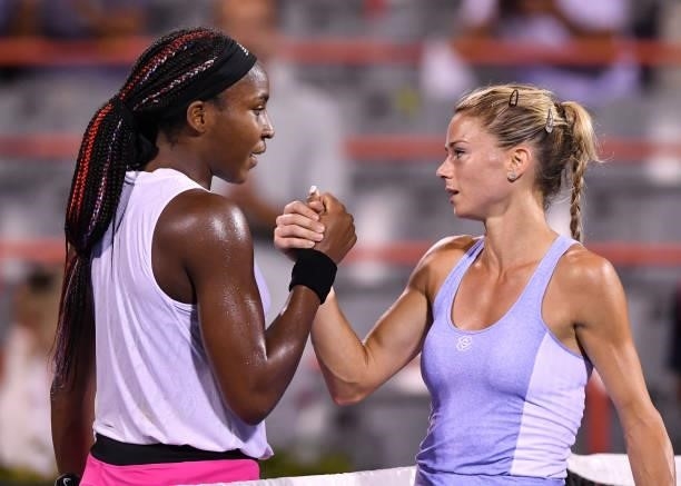 Cori Gauff of the United States congratulates Camila Giorgi of Italy for her victory during her Womens Singles Quarterfinals match on Day Five of the...