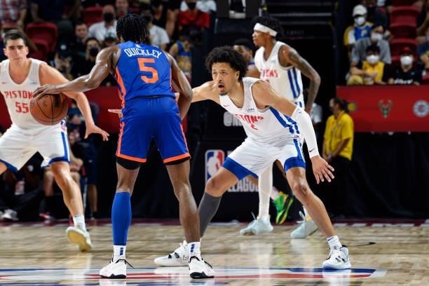 Cade Cunningham of the Detroit Pistons plays defense on Immanuel Quickley of the New York Knicks during the 2021 Las Vegas Summer League on August...
