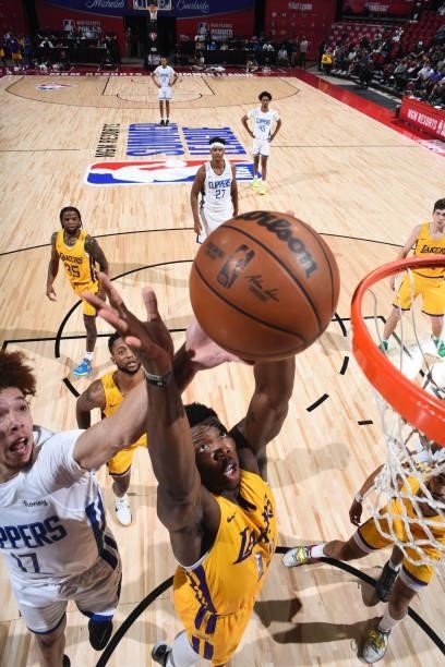 Devontae Cacok of the Los Angeles Lakers reaches for the rebound during the game against the LA Clippers during the 2021 Las Vegas Summer League on...